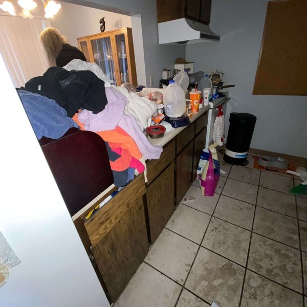Before: a cluttered home in need of hoarding cleanup
